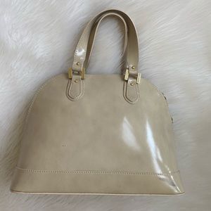 $378 Retail Tan purse.